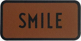 Design Letters | Style MyCover Smile - Sticker für Smartphone-Cases in Cognac